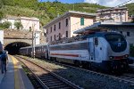 Nightjet 233 speeds between the tunnels at Riomaggiore